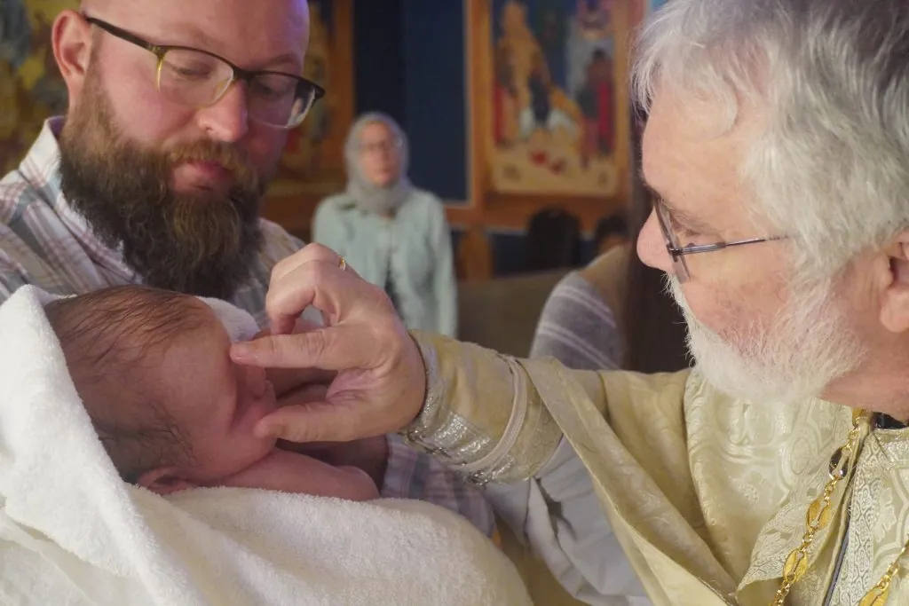 An Orthodox baptism at Saints Constantine & Elena