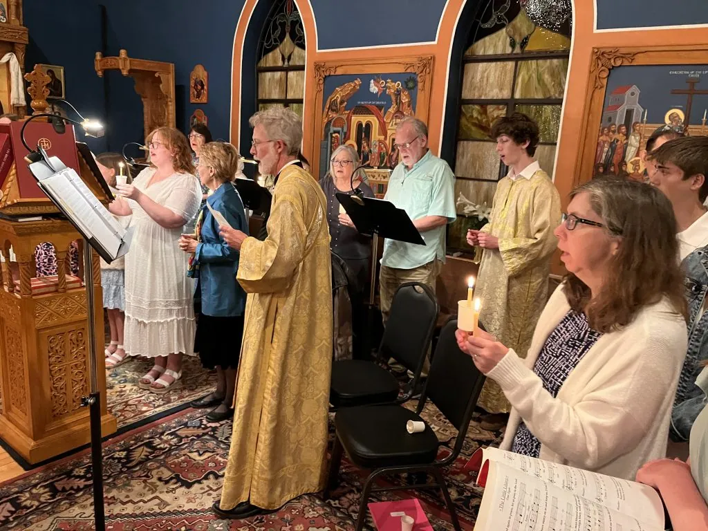 Subdeacon Max Murphy chanting during worship