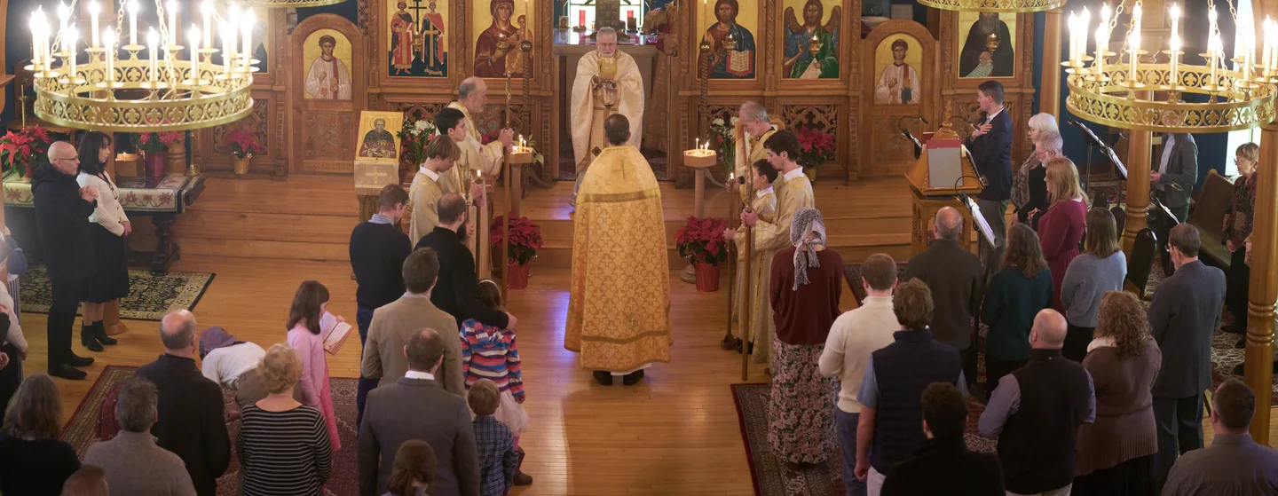 The congregation worshiping before the iconostasis at Saints Constantine & Elena
