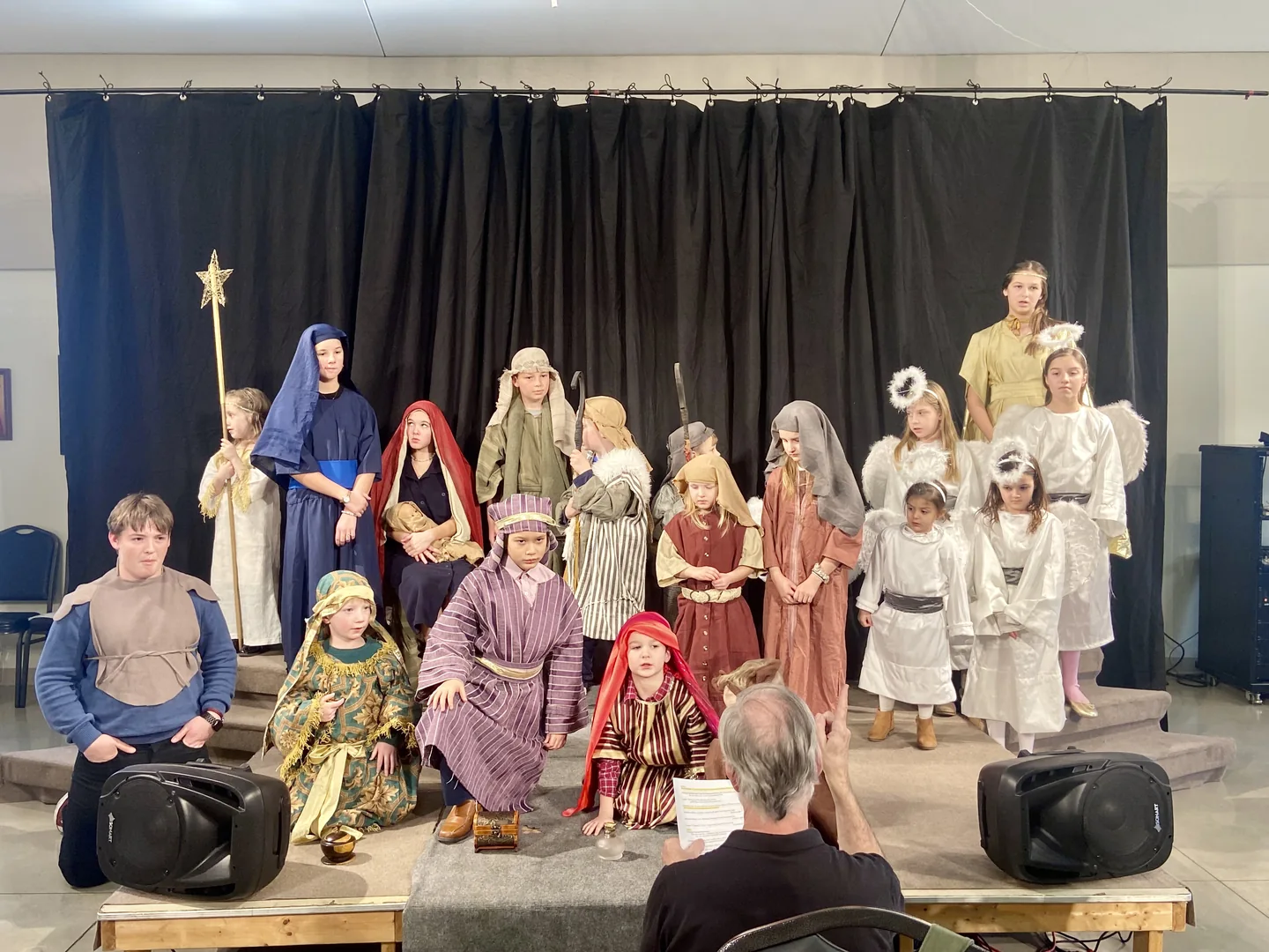 Children in costume performing the school Nativity play